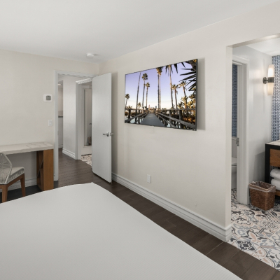 Bungalow bedroom with walkthrough to bathroom and living area