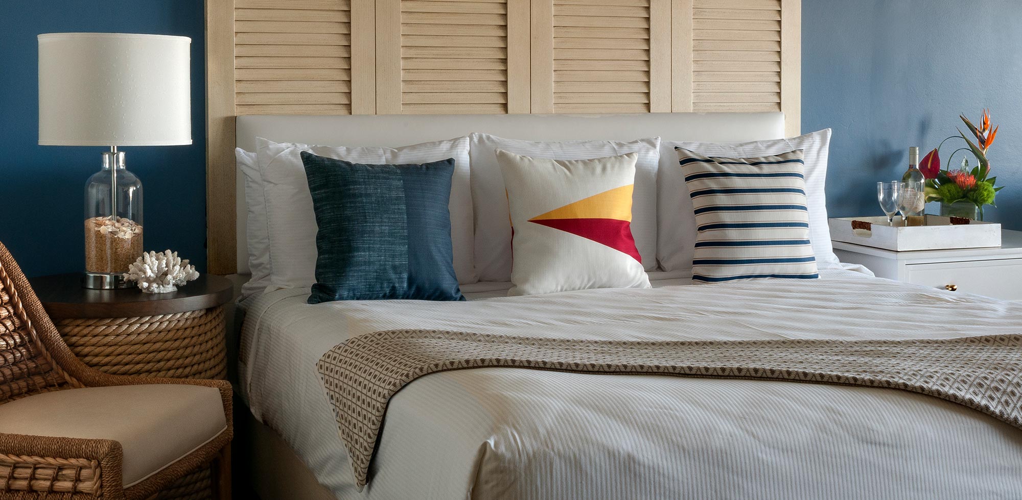 guestroom bed with three pillows