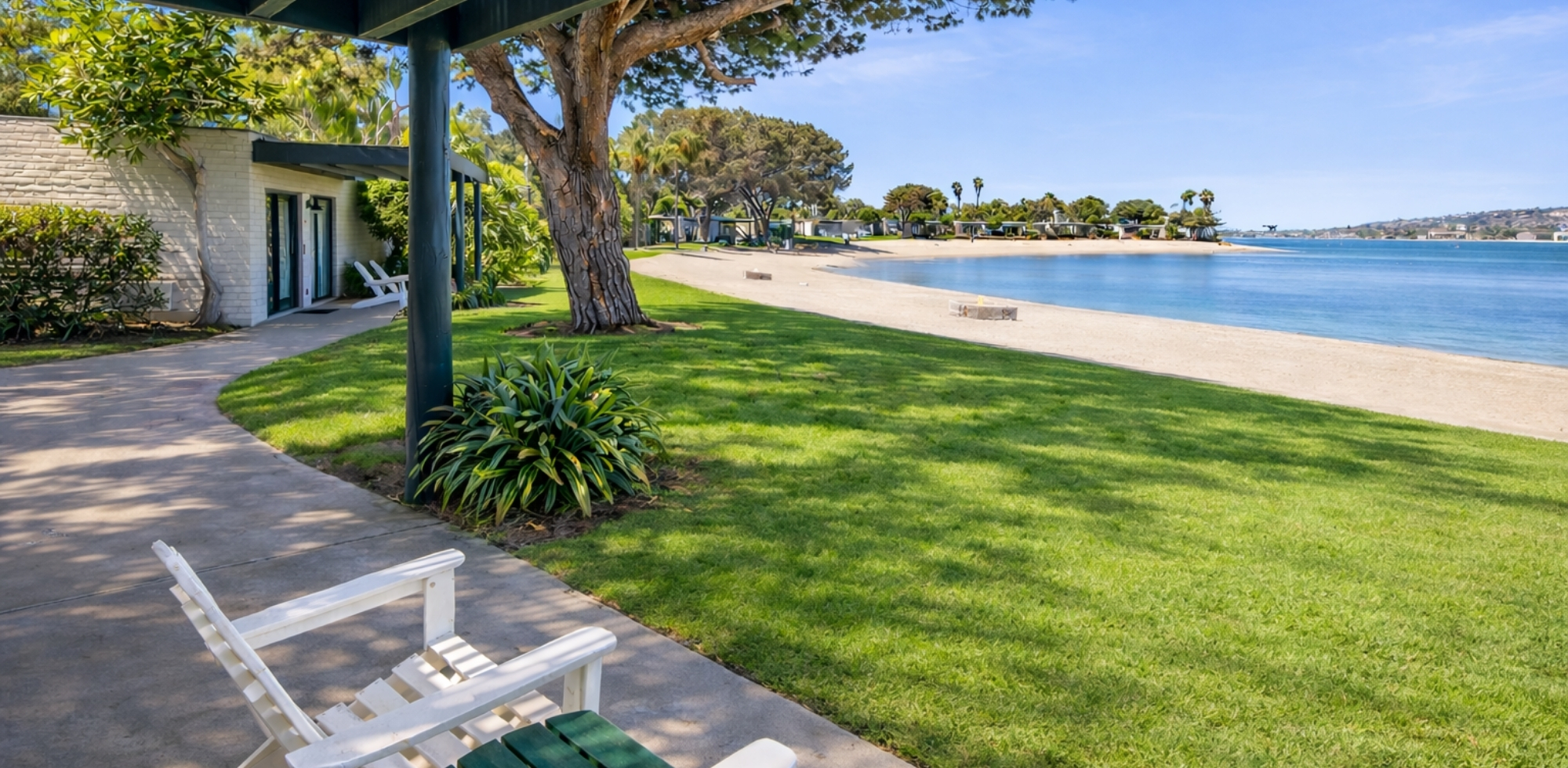 Adirondack chairs seating with waterfront views
