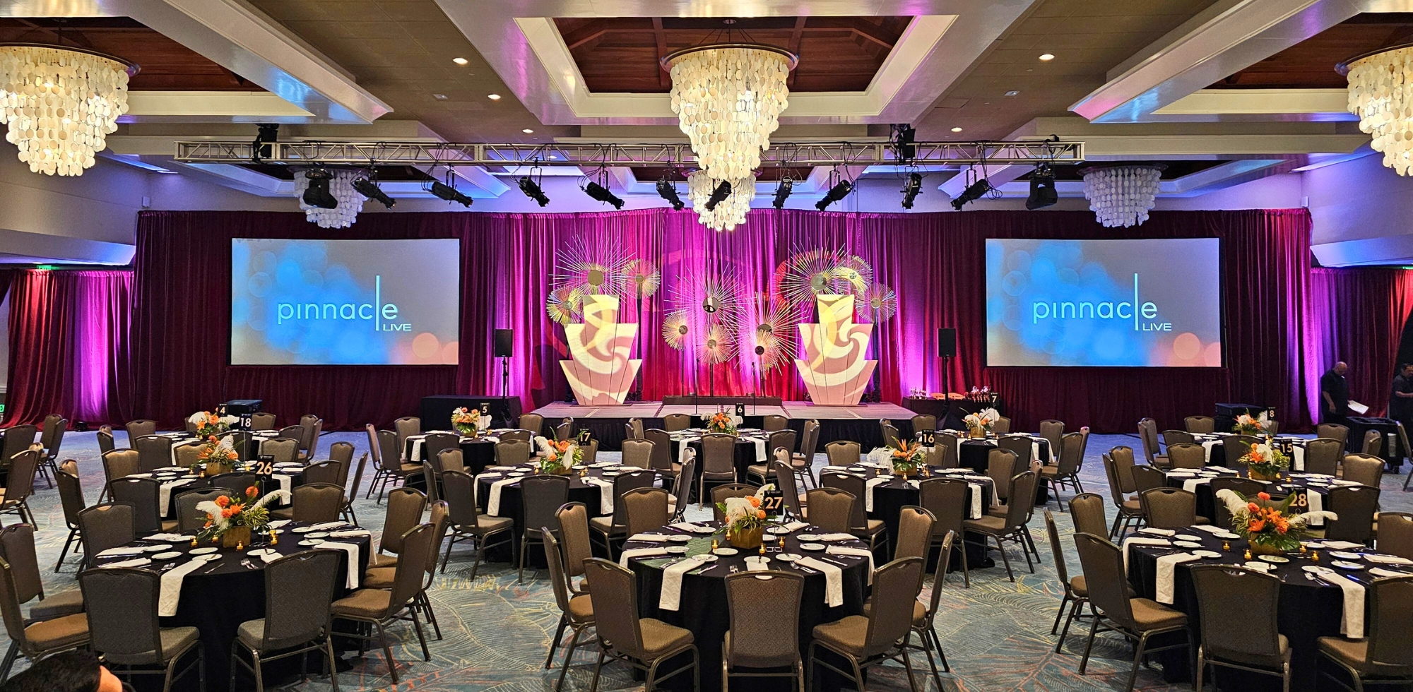 ballroom setup with lighting and chairs