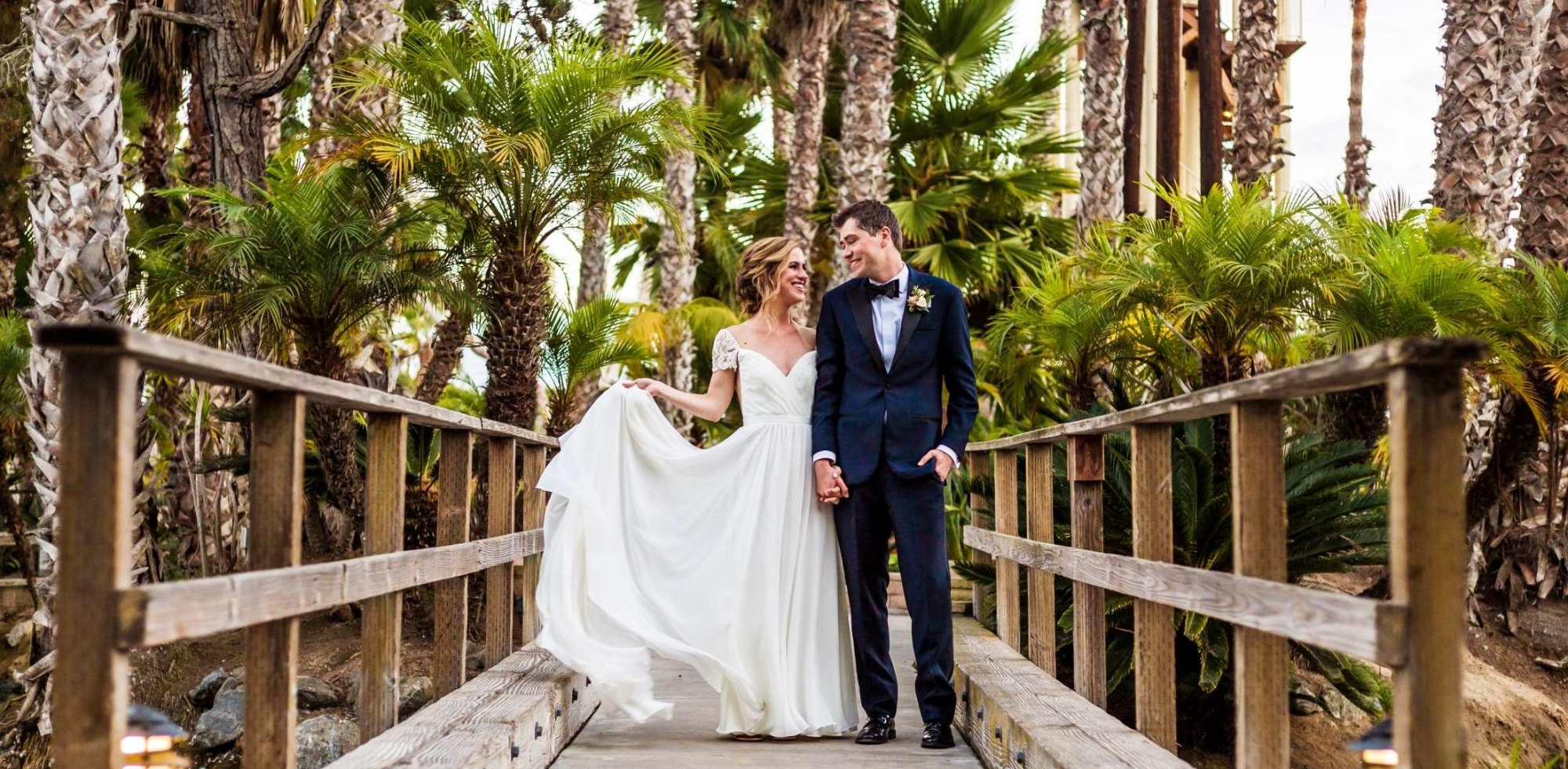 couple walking on bridge