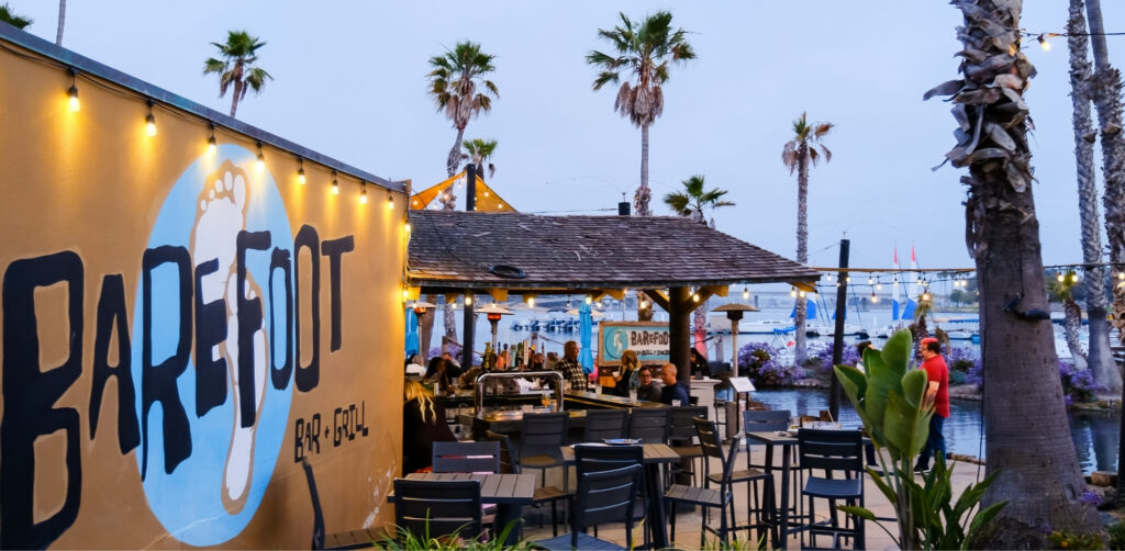 tropical dining setting with market lights