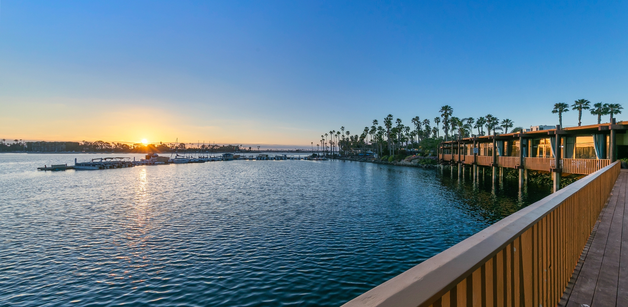 sunset view over mission bay near bridge walking path